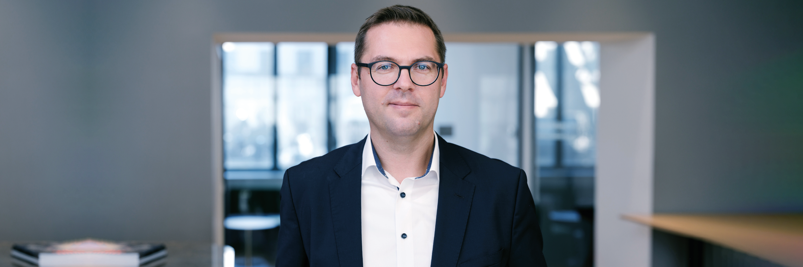 Jörg Galatz in the EFS Americas modern office space.